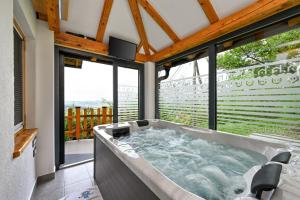 Holiday home with jacuzzi sauna terrace & garden 