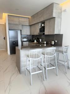 Apto de Ensueño Frente al Mar