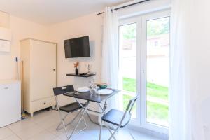 Appartements Le cocon de l-impasse a Tremblay en France : photos des chambres
