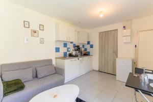 Appartements Le cocon de l-impasse a Tremblay en France : photos des chambres