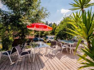 Campings Mobil Home 6 Pers avec Terrasse et Cuisine Equipee - API-1-52-561 : photos des chambres