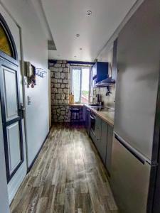 Appartements Charmant appartement avec jardin, barbecue et Netflix : photos des chambres