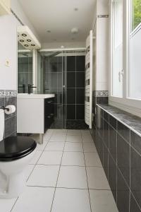 Appartements Charmant appartement avec jardin, barbecue et Netflix : photos des chambres