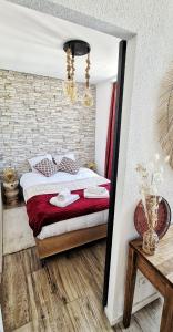 Appartements N2 Barbacane-Pieds Cite-Boheme Chic-Clim Mobile : photos des chambres