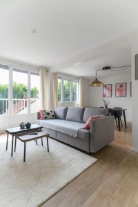 Appartements Le Raymond - Appartement proche du centre sportif, des rives de l'Allier et du centre-ville - parking : photos des chambres