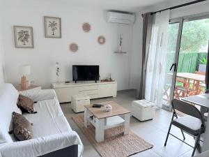 Appartements Appartement climatise avec jardin 4 personnes : photos des chambres