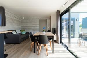 Maisons de vacances Chalet Omaha - 5min a pied de la Plage : photos des chambres