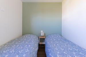 Maisons de vacances Chalet Omaha - 5min a pied de la Plage : photos des chambres