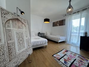 Maisons de vacances LAlhambra House - Circuit - 11p - Reve Au Mans : photos des chambres