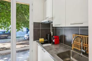 Appartements LX135 Studio proche centre-ville & parking gratuit : photos des chambres