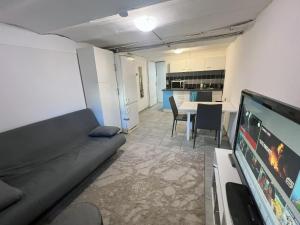 Paradix - Appartement en demi sous-sol dans maison à Argenteuil