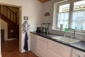 Maisons de vacances Charming house with garden near the port : photos des chambres