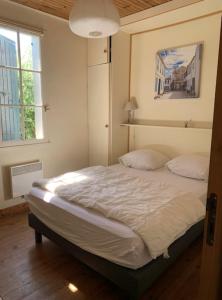 Maisons de vacances Charming house with garden near the port : photos des chambres