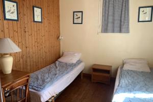 Maisons de vacances Charming house with garden near the port : photos des chambres