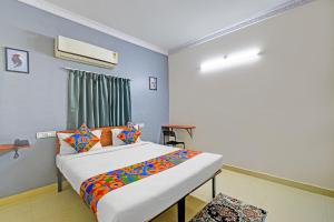 FabHotel AIG Broholic - 250m from AIG Hospital