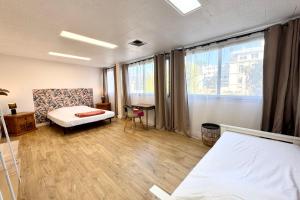 Appartements Gare a pied 5 chambres confort & espace : photos des chambres
