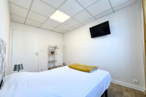 Appartements Gare a pied 5 chambres confort & espace : photos des chambres