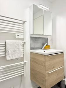 Appartements Gare a pied 5 chambres confort & espace : photos des chambres