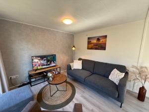 VELUWE RETREATS PUTTEN - Chalets with Huge Gardens and Private Saunas on Park with Swimming Pool, Cafeteria and More Facilities