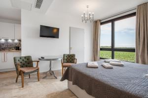 Appart'hotels Chateau Hermitage de Combas : photos des chambres