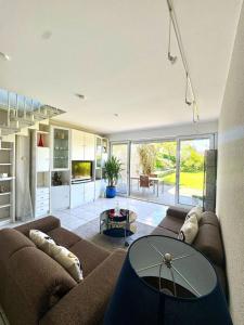 Ruhige Wohlfühloase auf zwei Ebenen - mit Terrasse im Grünen und Balkon