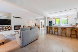 Gorgeous village home with heated pool, ideally located