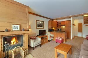 ARC 1950 - Appartement 10 personnes Duplex Cheminée - ski aux pieds - Sauna, Hammam, Jacuzzi, Piscine