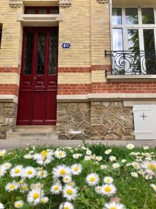 Maisons de vacances Maison et jardin a Epernay centre ville : photos des chambres