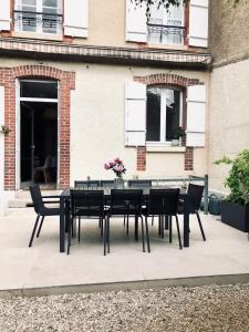 Maisons de vacances Maison et jardin a Epernay centre ville : photos des chambres