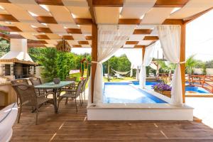 Eva & Dimitrios Villas, Captivating Oasis with Pools & BBQ, By ThinkVilla
