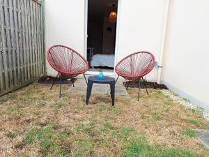 Appartements green cocoon studio and garden : photos des chambres