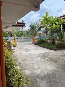 Simala Beach House Beachfront 4BR Retreat by the Sea