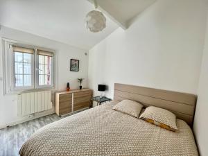 Appartements 3 Bedrooms with terrace 20 minutes to Paris center : photos des chambres