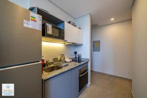 Brand new and steps away from Shopping del Sol!