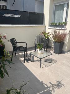 Appartements Cosy Home - Studio terrasse a 2 pas de Paris : Studio avec Terrasse