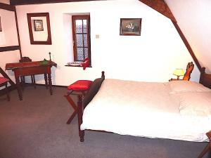 B&B / Chambres d'hotes Chambres a la Cour de l-abbaye d-Autrey : photos des chambres