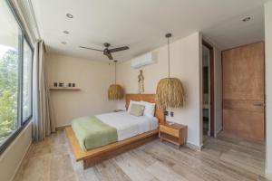 BT Homes - Tulum - Exclusiva villa de lujo con piscina, gym y pista de pádel