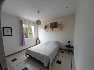 Maisons de vacances Maison avec jardin : photos des chambres