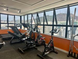 Downtown 2 Suites Piscina, ar, academia, cowork e vaga