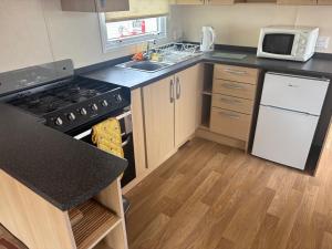 Clarach Bay Escape 3 Bedroom PetFriendly Caravan with Decking Sleeps 6