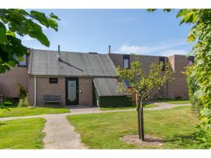 Holiday Home in De Punt with Pool & Garden