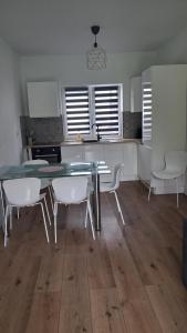 Apartament z dużym ogródkiem