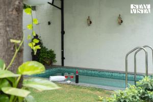 StayVista at House of Palm with Bonfire & Pool