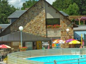 Campings Chalet 5 pers avec Terrasse et Cuisine equipee - API-1-52-296 : photos des chambres