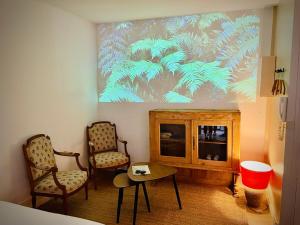 Appartements Le Nid Bellifontain : photos des chambres