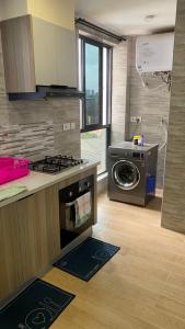 Beautiful executive two bedroom apartment with fully equipped gym heated swimming pool ample parking and scenic city view