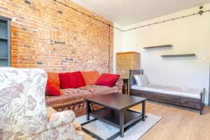Gliwice Industrial Brick Style Apartment by BookingHost