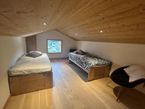 Chalets Maison mitoyenne ski & commodites : photos des chambres