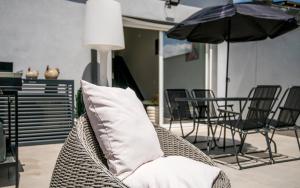 Appartements LA SUITE terrasse, wifi,parking,clim : photos des chambres