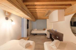 Appartements Secret Loft - Au coeur de Lyon avec home cinema & clim : photos des chambres